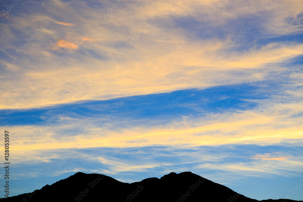 White clouds above the mountain (stratus)