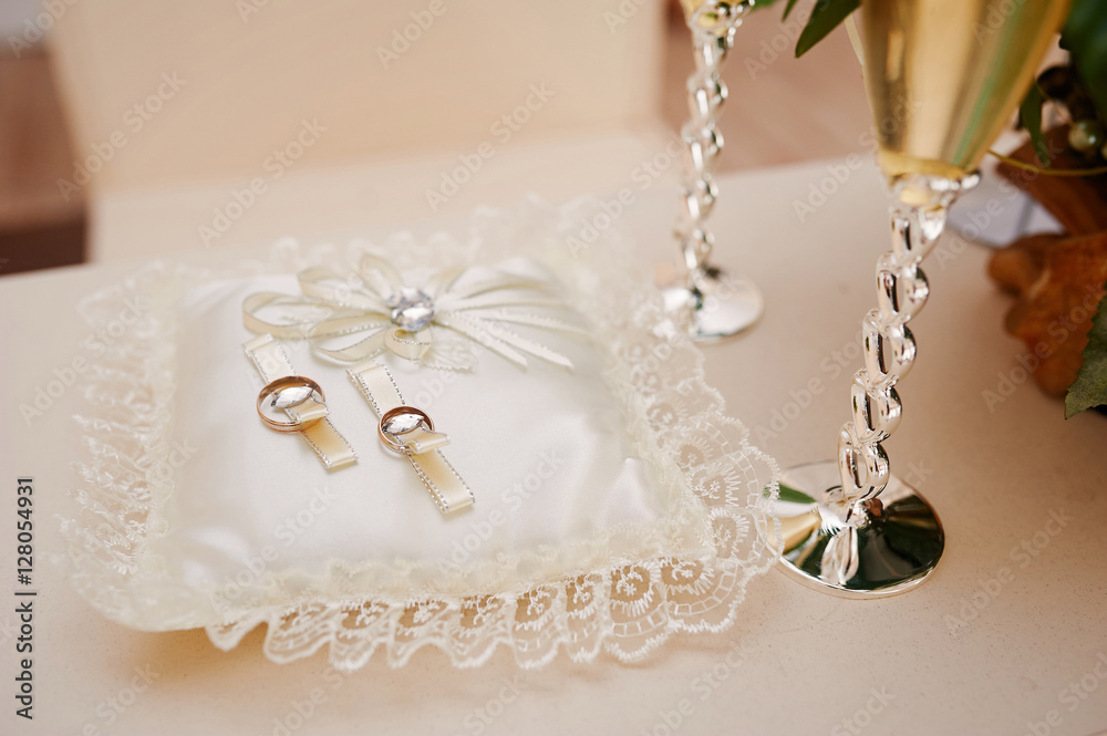 two gold rings on the pillow for the ceremony two gold rings on the pillow for the ceremony