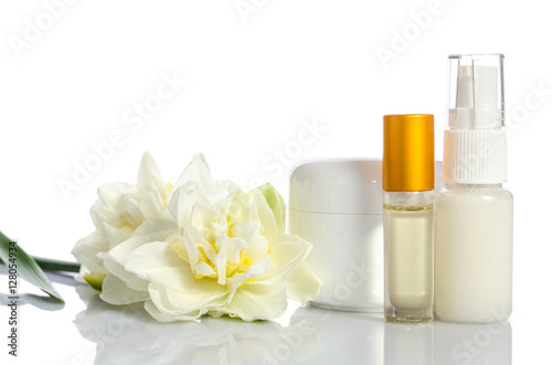 cosmetics with flowers isolated  on white background