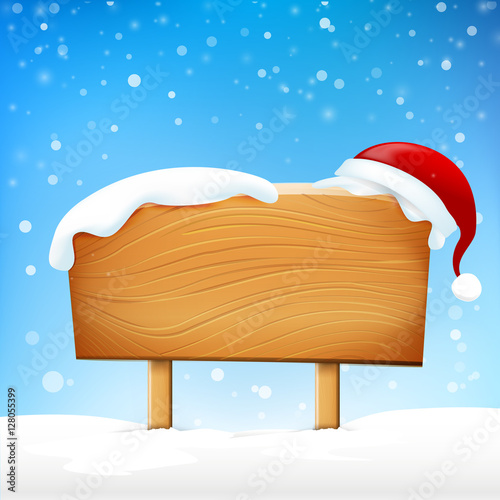 Wooden sign blank board and winter snow falling with copy space