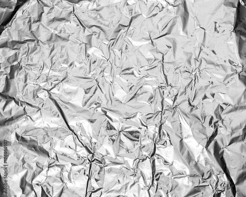 silver leaf foil background with shiny crumpled uneven surface f silver leaf foil background with shiny crumpled uneven surface f