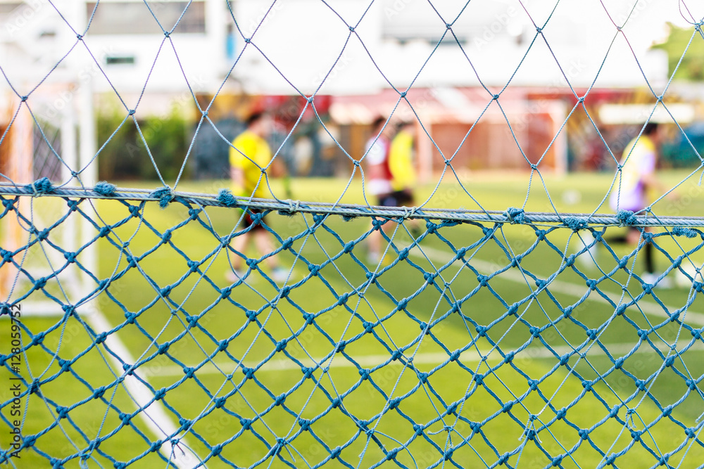 Obraz premium The background of futsal goalkeeper with front of gates net