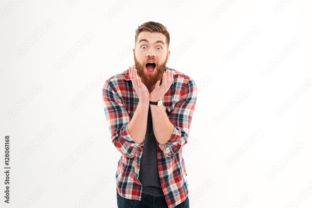 Portrait of a shocked casual man looking at camera Portrait of a shocked casual man looking at camera