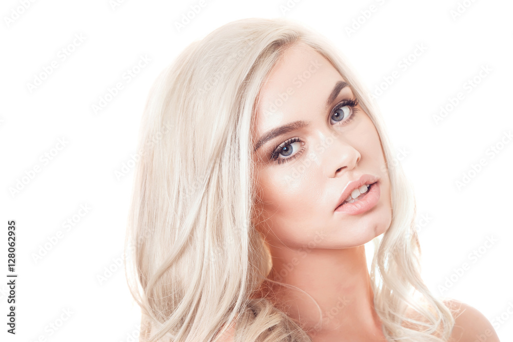Portrait of beautiful blonde woman with makeup and styling on white background. Isolated. Bare shoulders. Portrait of beautiful blonde woman with makeup and styling on white background. Isolated. Bare shoulders.