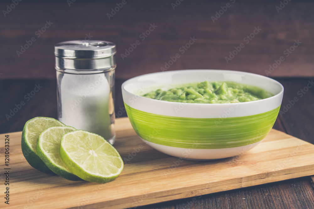 avocado Guacamole on molcajete real Mexican traditional procedur avocado Guacamole on molcajete real Mexican traditional procedur