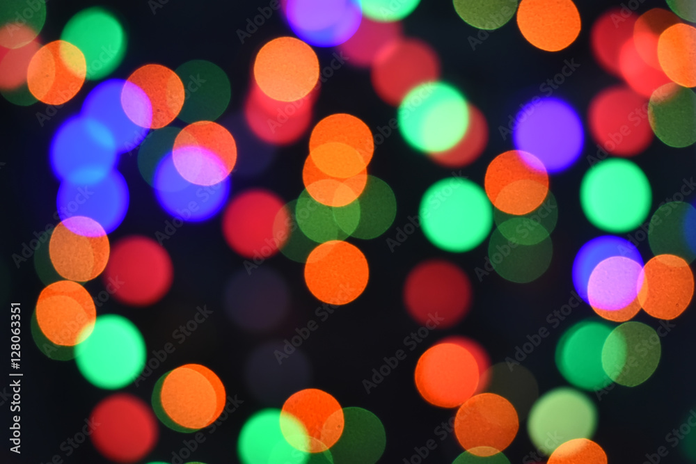 Colorful Star bokeh blurred abstract background. Christmas and new year party concept.