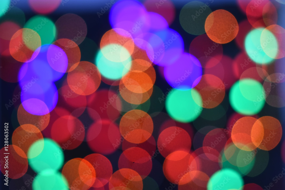 Colorful Star bokeh blurred abstract background. Christmas and new year party concept.