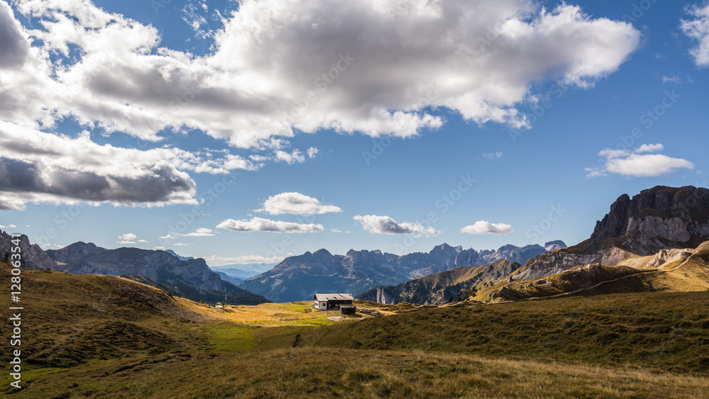 Great view of the Val di Fassa valley. National Park Dolomites (Dolomiti), pass Sella. Location famous resort Canazei, Tyrol, Alp, Italy, Europe. Dramatic and picturesque scene. Beauty world. Great view of the Val di Fassa valley. National Park Dolomites (Dolomiti), pass Sella. Location famous resort Canazei, Tyrol, Alp, Italy, Europe. Dramatic and picturesque scene. Beauty world.
