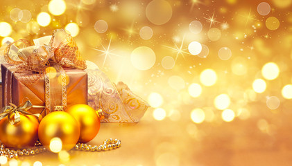 Christmas and New Year golden baubles and decorations. Winter holiday art design