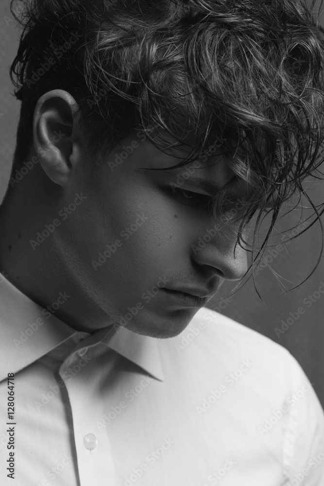 Male beauty concept. Profile portrait of young man with perfect haircut Male beauty concept. Profile portrait of young man with perfect haircut