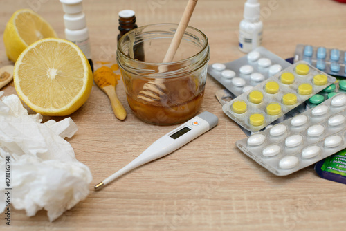 Various remedies for cold on a wooden background