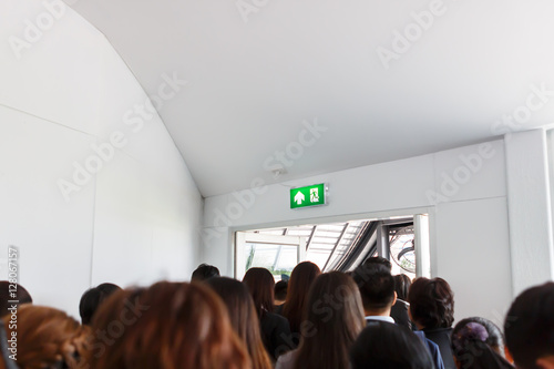 Fotografie, Obraz People escape to fire exit door