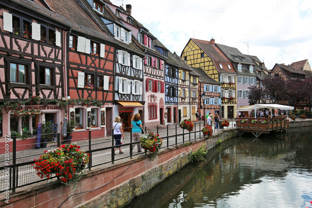 Colorful traditional french houses on the side of river Colmar, France, Alsace