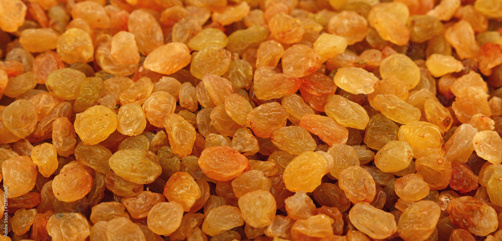 White grape small raisin close up high angle White grape small raisin close up high angle