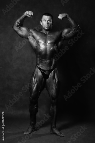 Muscular male Bodybuilder posing