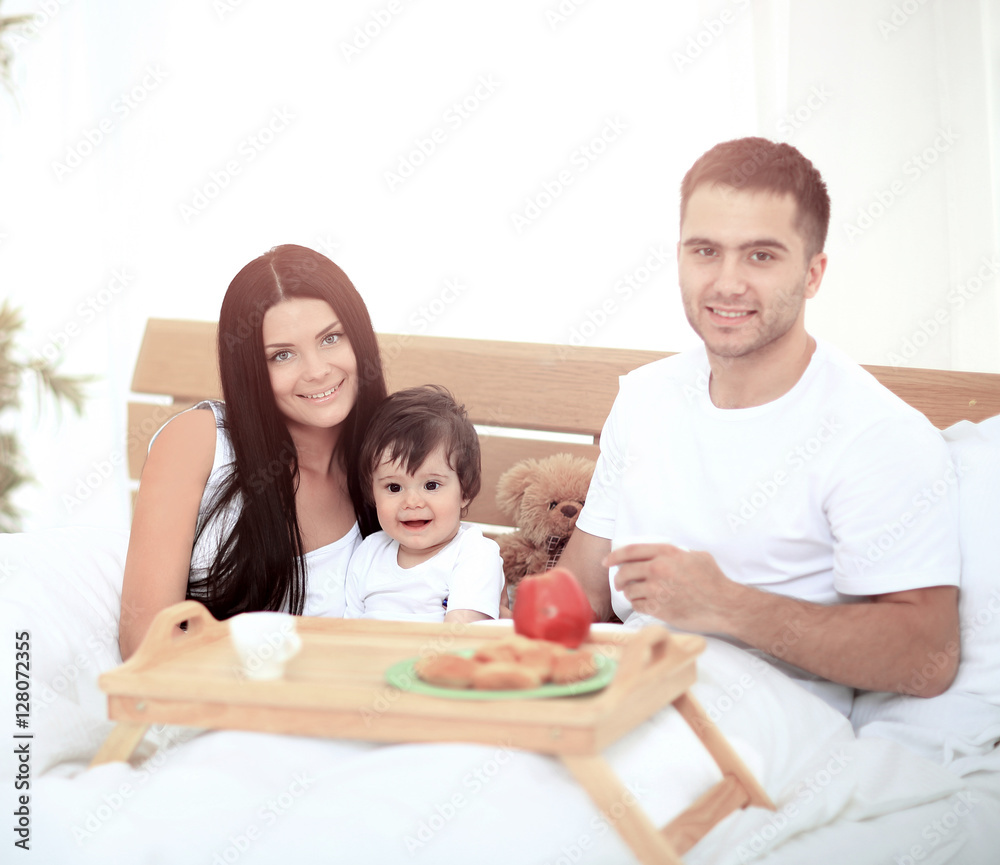 Smiling family having breakfast Smiling family having breakfast