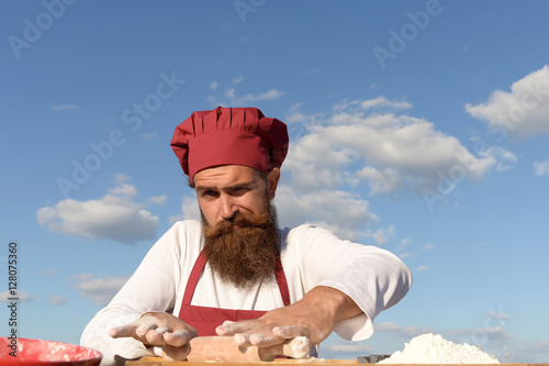 berded man chef cooking outdoor photo