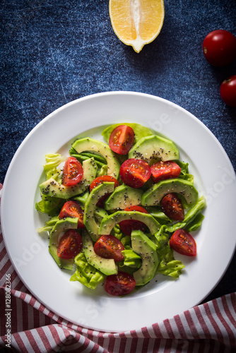 Avocado salad with cherry tomatoes and chia seeds