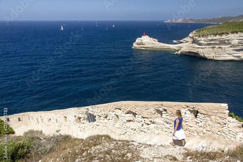 Walking on the ancient walls of Bonifacio, Corsica, France photo