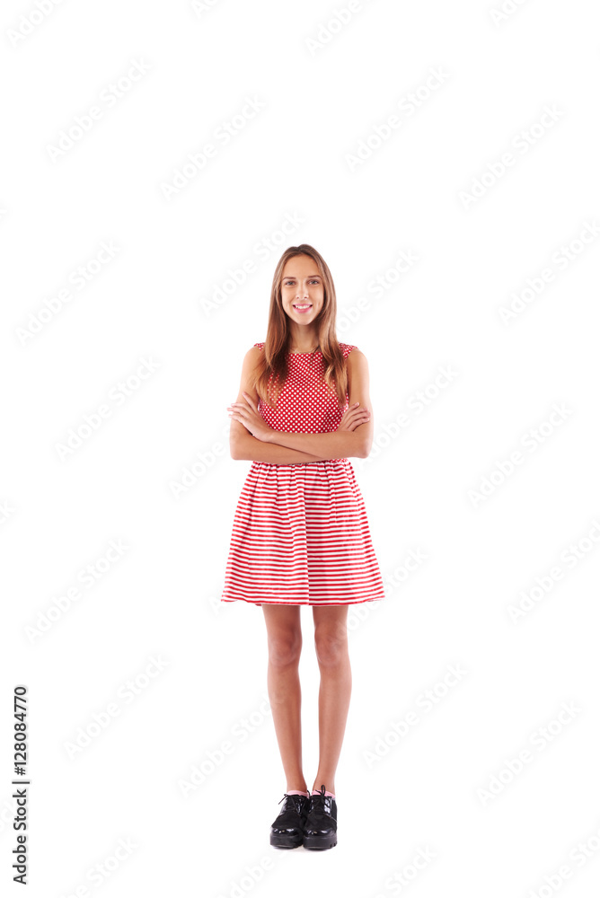 Positive teenager with arms folded on chest over white studio ba Positive teenager with arms folded on chest over white studio ba