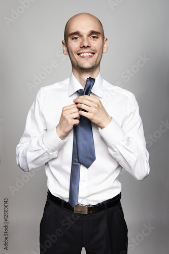 Man Tying a Tie