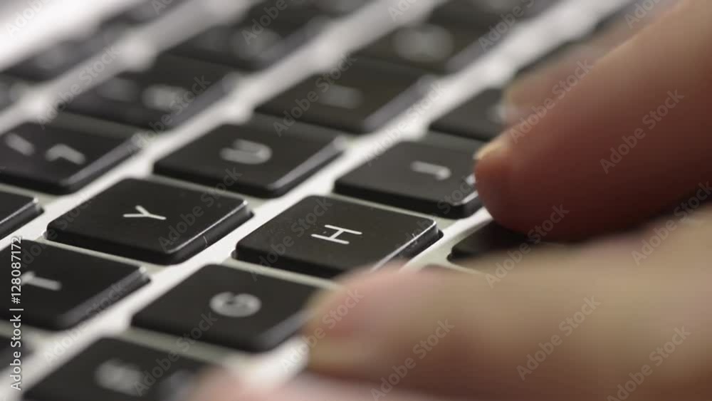 Hands typing on computer keyboard in close up. Film clip of office work and communication technology. Hands typing on computer keyboard in close up. Film clip of office work and communication technology.