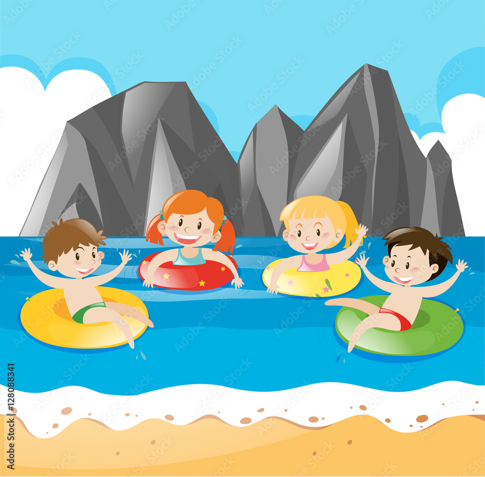 Four kids swimming in the ocean