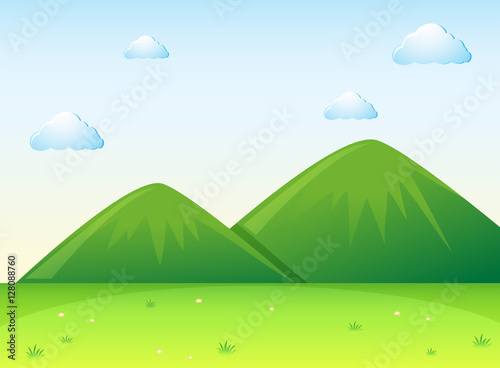 Nature scene with green field and hills