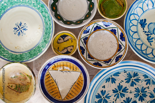 Ceramic plates with fishes, yellow and blue. Old