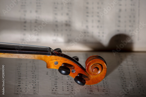 Vintage violin on the sheet music. 