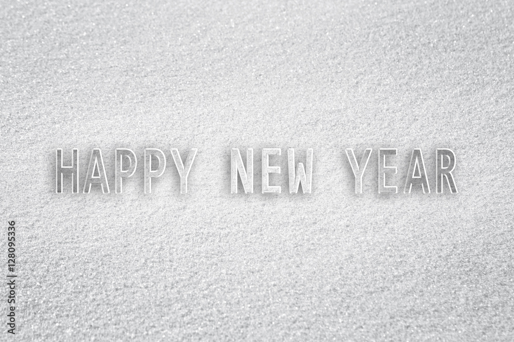 Beautiful happy new year written on white fresh sunny snow background. Happy new year greeting card background. Selective focus used. Beautiful happy new year written on white fresh sunny snow background. Happy new year greeting card background. Selective focus used.