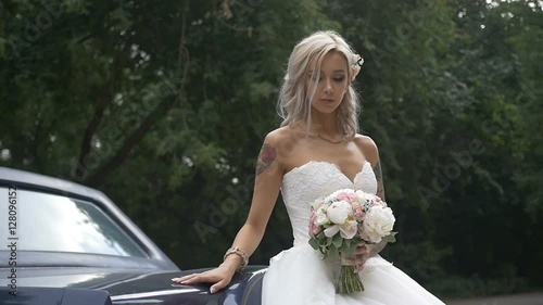 Wedding. The bride posing for photographer