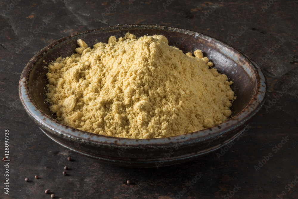Ground Yellow Mustard in a Bowl