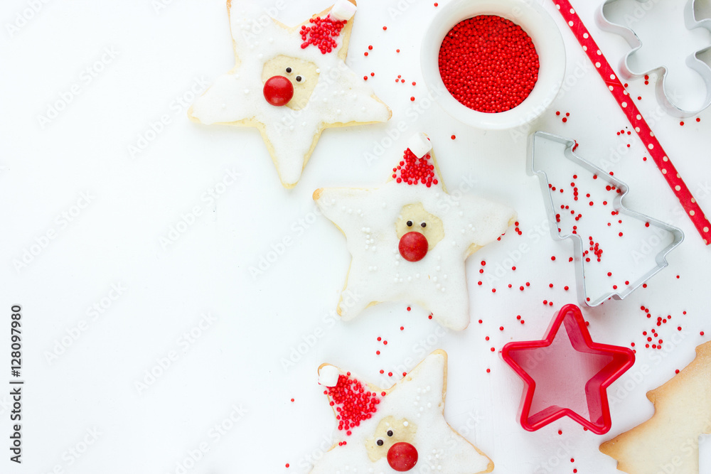 Christmas Xmas New Year baking concept with cute holiday santa cookies Christmas Xmas New Year baking concept with cute holiday santa cookies
