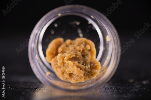 Fotografija Marijuana extraction concentrate aka wax crumble isolated