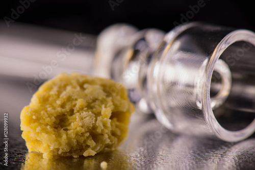 Marijuana extraction concentrate aka wax crumble on dark backgro photo