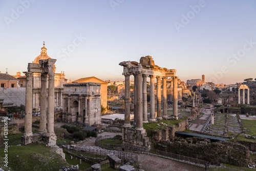 Sunset light on the Roman Forum, the Colosseum in the background, Rome, Italy
