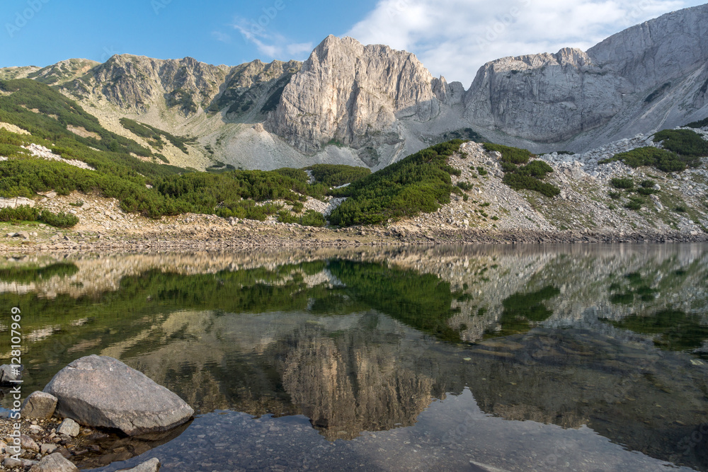 White rocks of Sinanitsa peak and  reflectionin the lake, Pirin Mountain, Bulgaria