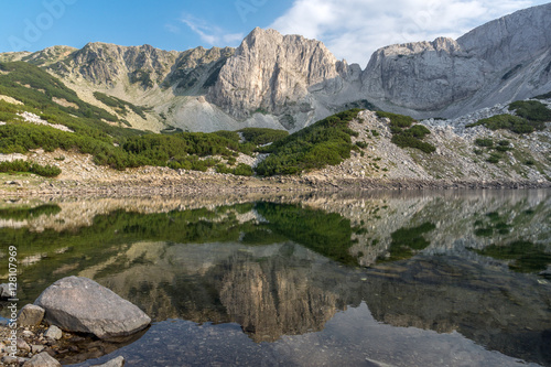 White rocks of Sinanitsa peak and reflectionin the lake, Pirin Mountain, Bulgaria