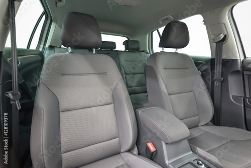 Textile seats in modern car. Interior detail. © alexdemeshko