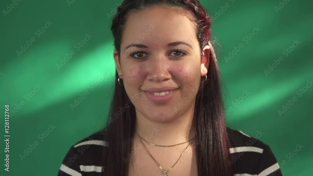 Cuban people and emotions, portrait of pretty latina girl laughing and looking at camera. Happy hispanic young woman from Havana, Cuba smiling