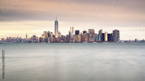 Manhattan skyline with Freedom Tower at sunrise, New York City, USA photo