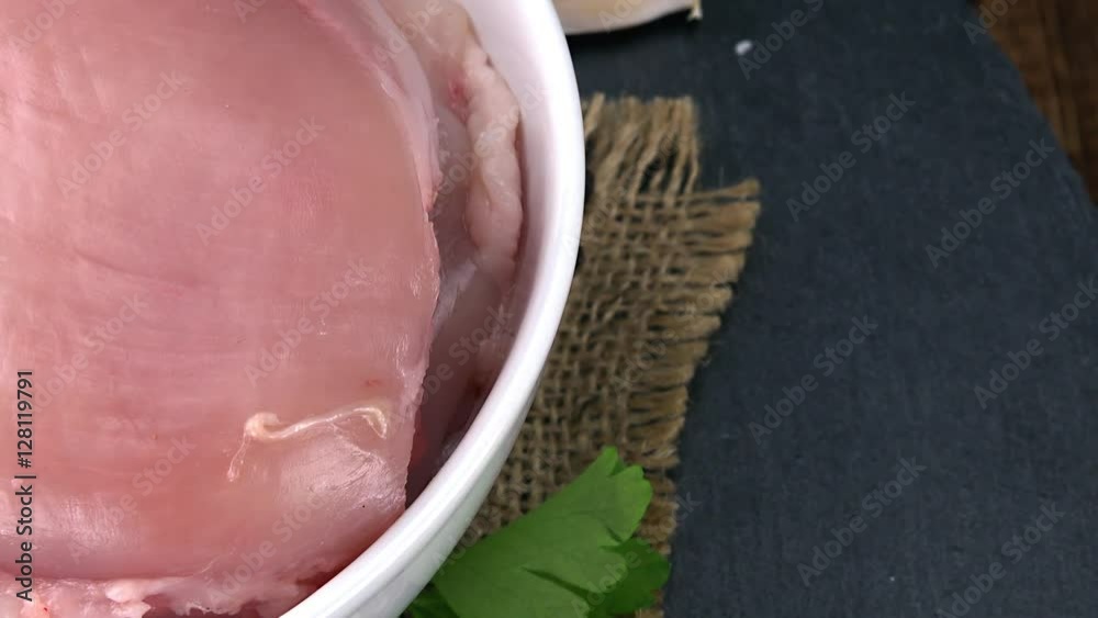Piece of raw Chicken Fillet as rotating not loopable 4K clip Piece of raw Chicken Fillet as rotating not loopable 4K clip