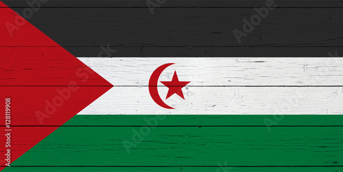 Flag of the Sahrawi Arab Democratic Republic on wooden background
