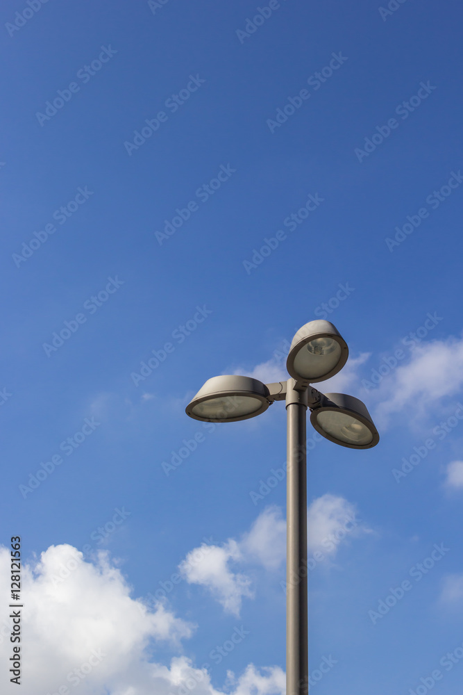 street lamp with blue sky.