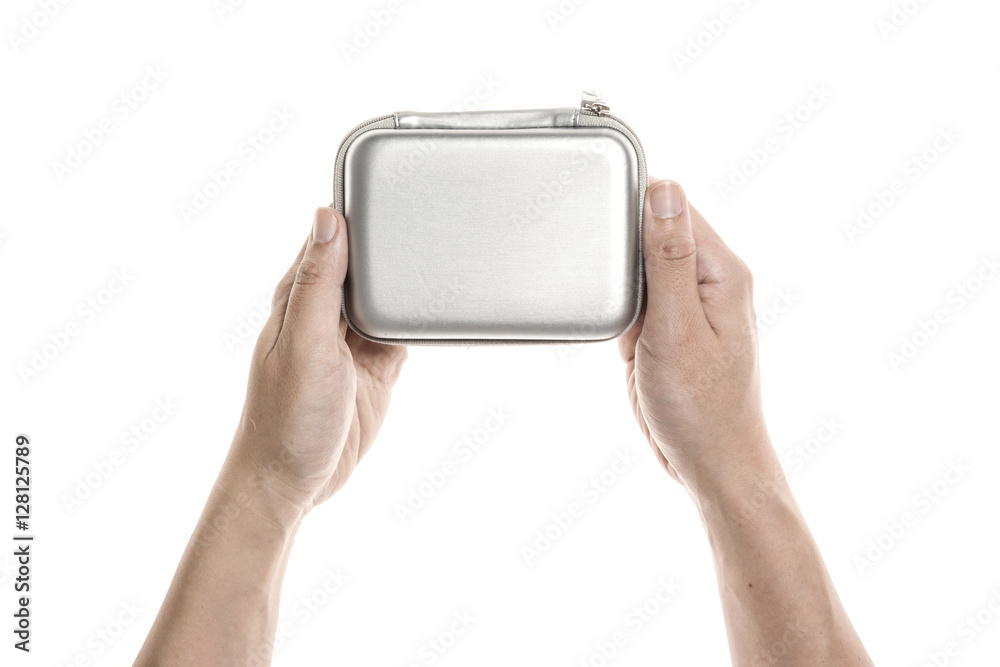 Two hands hold a portable hard disk isolated white. Two hands hold a portable hard disk isolated white.