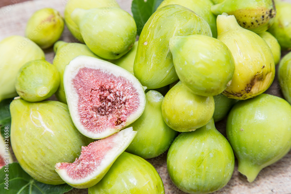 Ripe fig fruits on the wooden table. Ripe fig fruits on the wooden table.