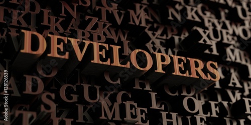 Developers - Wooden 3D rendered letters/message. Can be used for an online banner ad or a print postcard.