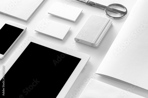 Brand identity mockup. Blank corporate stationery and gadgets photo