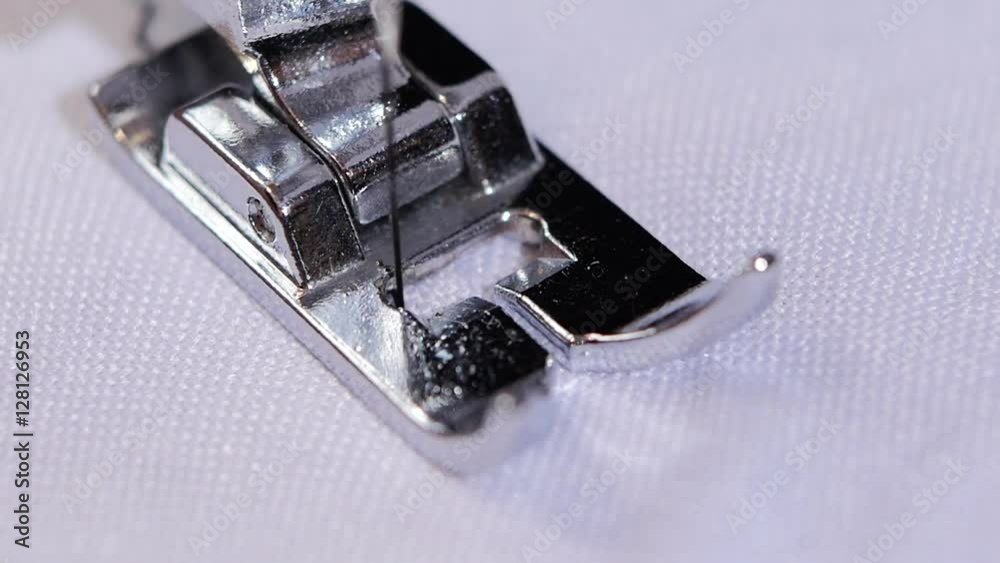 Sewing needle does figured seam. Slow motion Sewing needle does figured seam. Slow motion
